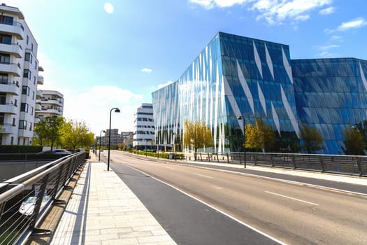 Modern glass office building in an expensive area of Copenhagen, Denmark - August 30, 2023.