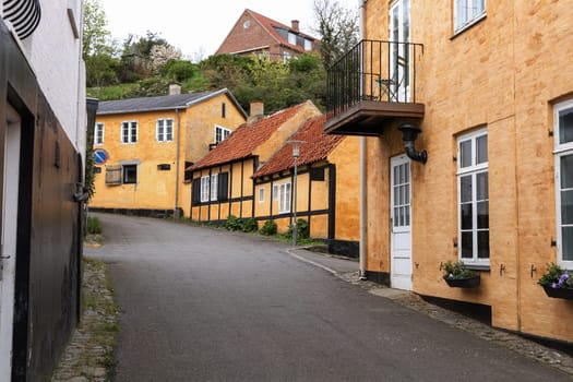 Traditional old residential houses with tiled roofs on the island of Bornholm, Denmark. High quality photo