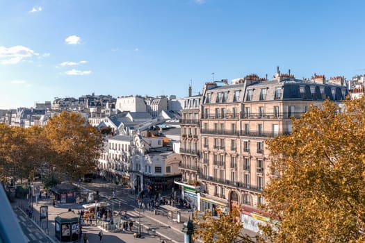 View to the streets of Montmartre and roofs of buildings in Paris, France. Paris, France - October 25, 2024