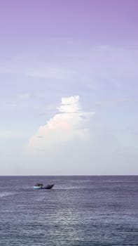 Sea sky cumulus cloud landscape view background. Calm water alone fishing boat. Destination aim progress concept.