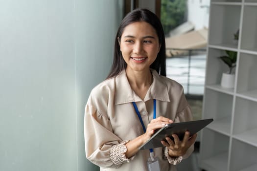 A businesswoman engaged in a creative brainstorming session showcasing collaboration and innovation in a contemporary workspace.