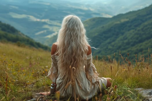 A peaceful and tranquil scene of a woman engaged in meditation within a stunning natural setting full of beauty