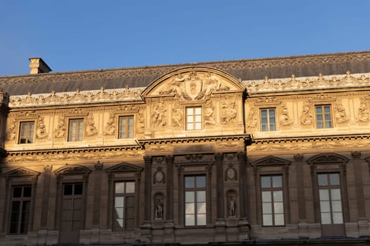 Discover the extraordinary grandeur and beauty of the Louvre Museums stunning and iconic facade located in Paris, France - October 24, 2024