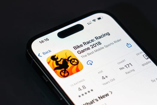 New York, USA - December 20, 2024: Bike Race Racing Game 2018 app displayed on smartphone screen with logo. Exciting motorbike racing game featuring dynamic tracks and stunts