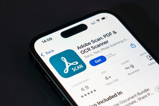 New York, USA - December 20, 2024: Adobe Scan app displayed on smartphone screen with logo. Mobile application for scanning, converting, and managing PDF documents