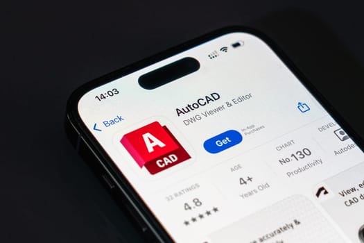 New York, USA - December 20, 2024: AutoCAD app displayed on smartphone screen with logo. CAD software application for drafting, design, and engineering solutions
