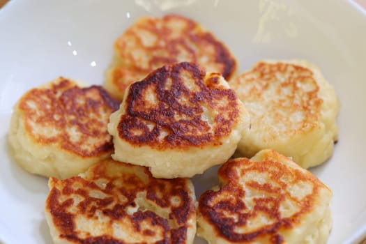 Delicious potato pancakes, golden brown and crispy, perfect for breakfast or a tasty snack any time