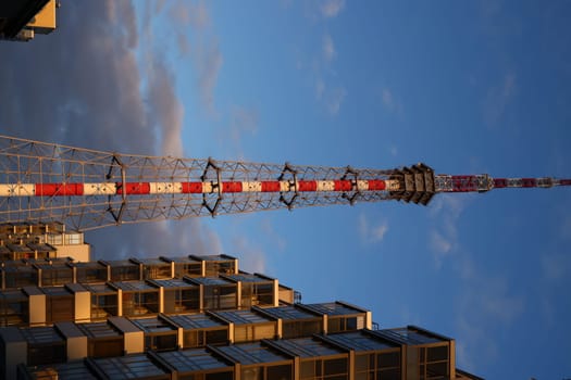 A stunning and breathtaking view of a communication tower beautifully set against a vivid evening sky backdrop