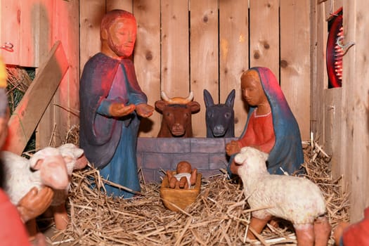 Wooden Christmas creche with Joseph Mary and small Jesus
