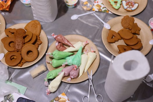 Enjoy a lively cookie decorating setup with colorful icing and festive shapes for endless creative fun