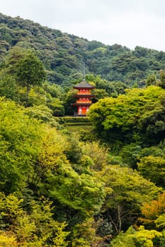 The iconic Kiyomizu-dera temple and mountain view on a sunny spring day in Kyoto, Japan
