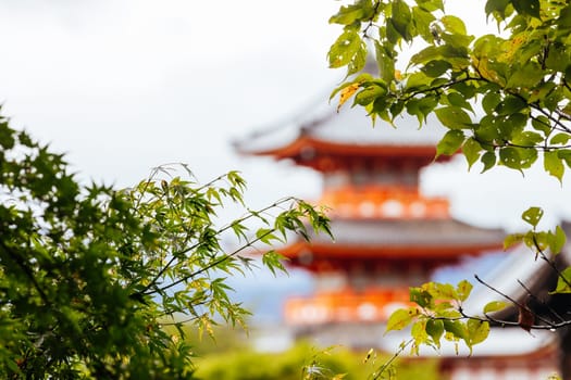 The iconic Kiyomizu-dera temple and mountain view on a sunny spring day in Kyoto, Japan