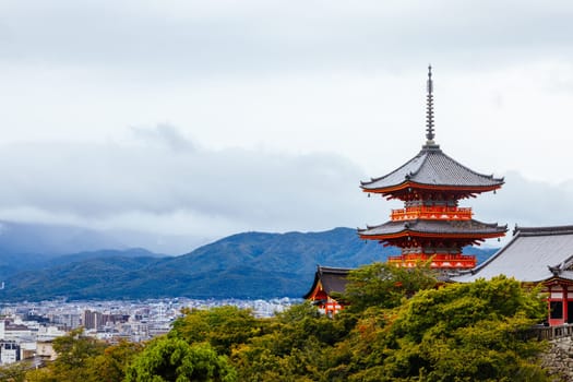 The iconic Kiyomizu-dera temple and mountain view on a sunny spring day in Kyoto, Japan