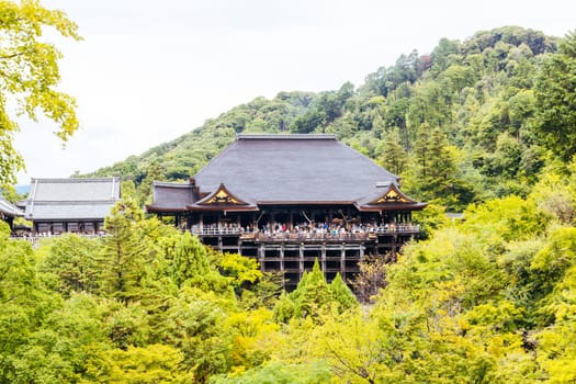 The iconic Kiyomizu-dera temple and mountain view on a sunny spring day in Kyoto, Japan