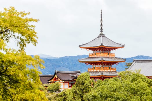 The iconic Kiyomizu-dera temple and mountain view on a sunny spring day in Kyoto, Japan
