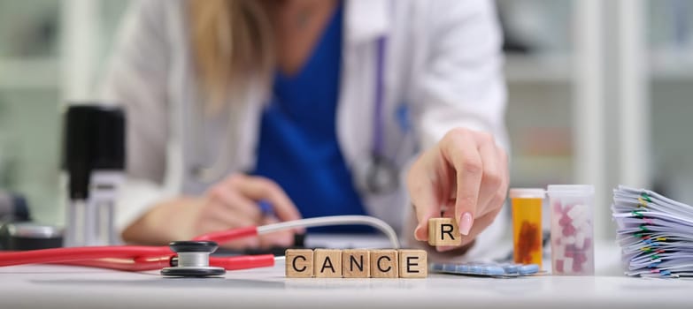 A dedicated healthcare practitioner thoroughly analyzing crucial cancerrelated information and medications