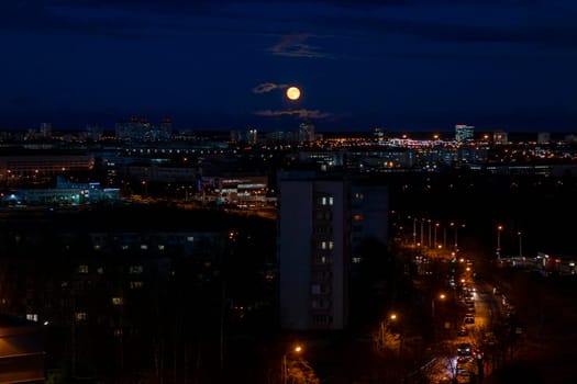 Cars moving on the night road.