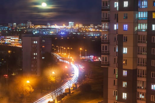 Cars moving on the night road.