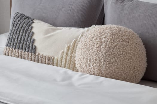 These stylish cushions, showcasing unique textures, are perfect for enhancing modern home decor and aesthetics
