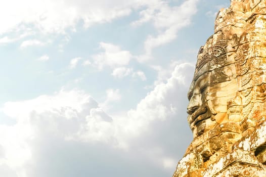 The face of the Temple of Bayon Nakhon Thom by day, Angkor, Siem Reap, Cambodia