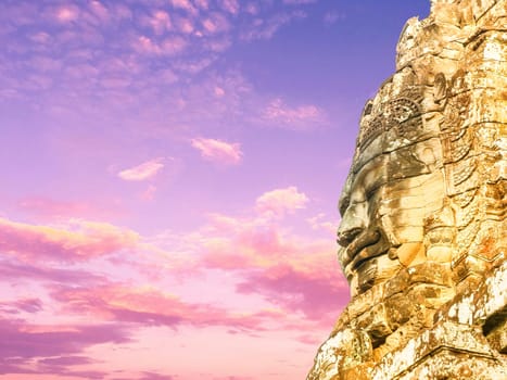 The face of the Temple of Bayon Nakhon Thom by sunset, Angkor, Siem Reap, Cambodia
