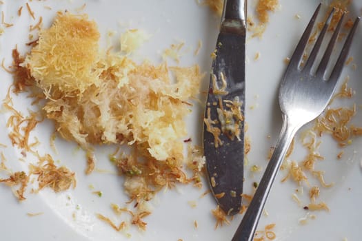 A used plate adorned with remnants, showcasing the delightful aftermath of a delicious meal