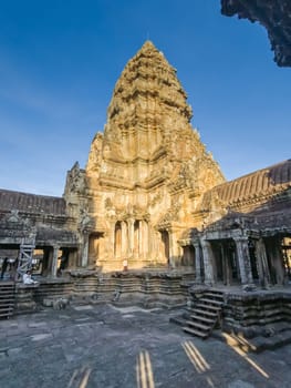 Ruin of ancient Angkor Wat temple by day in Angkor, Cambodia