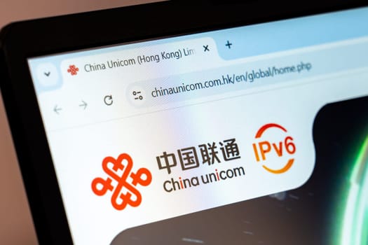 New York, USA - December 21, 2024: China Unicom website homepage displayed on laptop screen with logo. Leading telecommunications company offering mobile, broadband, and data services