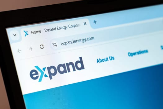 New York, USA - December 21, 2024: Expand Energy website homepage displayed on laptop screen with logo. Renewable energy company specializing in sustainable solutions and clean energy technologies