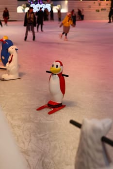 Colorful and charming penguin figures significantly enhance the joyful and fun atmosphere at an ice skating rink