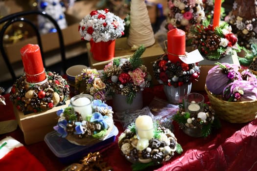 These are beautifully crafted floral decorations adorned with candles, designed for added aesthetic appeal