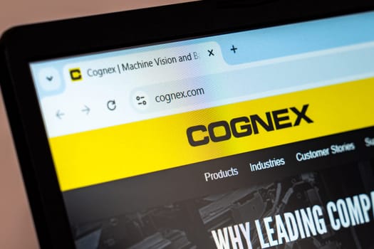 New York, USA - December 21, 2024: Cognex Corporation website homepage displayed on laptop screen with logo. Machine vision and industrial automation company specializing in inspection, identification, and guidance solutions