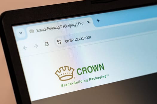 New York, USA - December 21, 2024: Crown website homepage displayed on laptop screen with logo. Manufacturer of innovative packaging solutions for consumer goods and food products