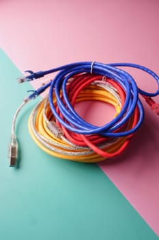 Stack of colorful elastic rubber bands on table ,