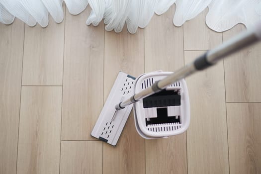 This sleek mop with a bucket is perfect for efficient home cleaning and maintaining tidiness