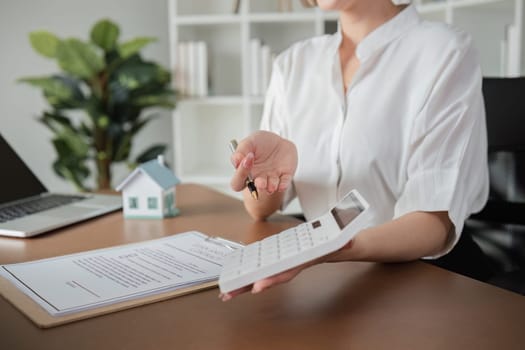 A real estate professional discusses property details with a client emphasizing negotiation strategies.