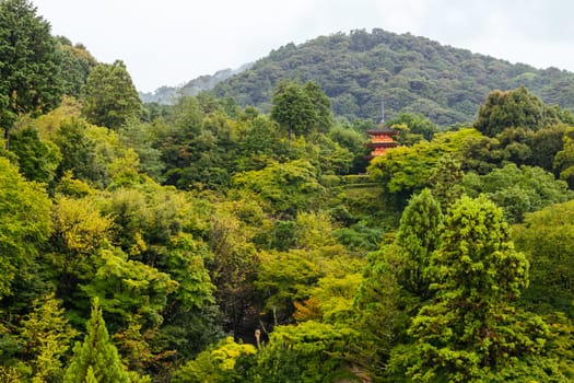 The iconic Kiyomizu-dera temple and mountain view on a sunny spring day in Kyoto, Japan