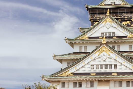 OSAKA, JAPAN - SEPTEMBER 25 2024: The iconic Osaka Castle and lush surrounds on a warm clear autumn day in Osaka, Japan on September 25th 2024