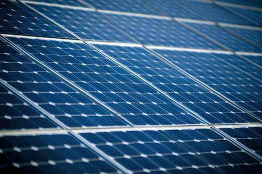 A detailed view of solar panels arranged in a grid pattern, reflecting sunlight and contributing to sustainable energy solutions. Ideal for renewable energy themes.