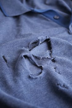 hole in the clothes. Close-up