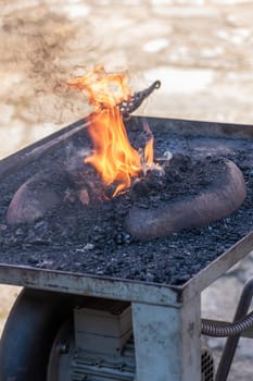 Mobile blacksmith forge for hand forging, demonstration of old crafts