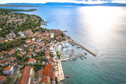 Krk island. Town of Njivice waterfront aerial view, Krk island in Croatia