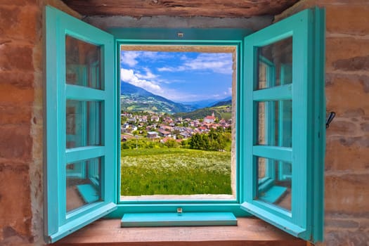Dolomites. Idyllic alpine village of Gudon architecture and landscape view through window, Bolzano province in Trentino Alto Adige region of Italy