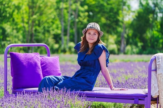 Enchanting Elegance: A Beautiful Girl amidst Lavender Fields. A Dreamy Summer Photo Session in the Lavender Field