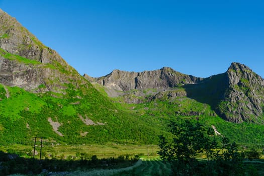 Dramatic, Picturesque scene, Breathtaking, Impressive summer landscape of lofoten island, Norway. Colorful sunny scene in Norway. Beauty of nature concept background.