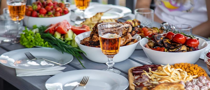 Vegetables and meat are grilled on the table. Selective focus. Food.