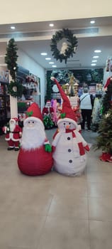 new year tree, christmas holiday green white red flower, Santa Clause,ball decor. High quality photo
