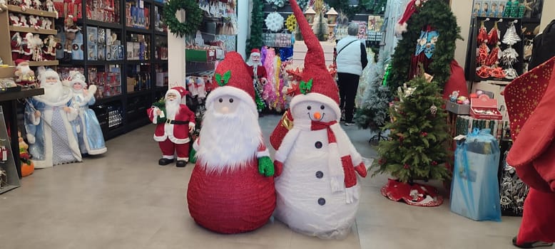 new year tree, christmas holiday green white red flower, Santa Clause,ball decor. High quality photo