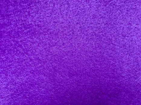 Vibrant purple texture with rough surface and rich color depth.