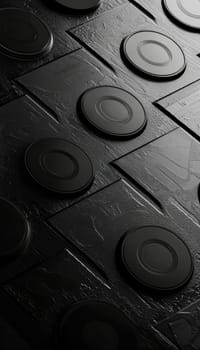 Sleek monochromatic logo designs arranged on a polished black surface, highlighted by dramatic studio lighting. perfect for depicting modern design elements, branding concepts, or stylish promotional materials.